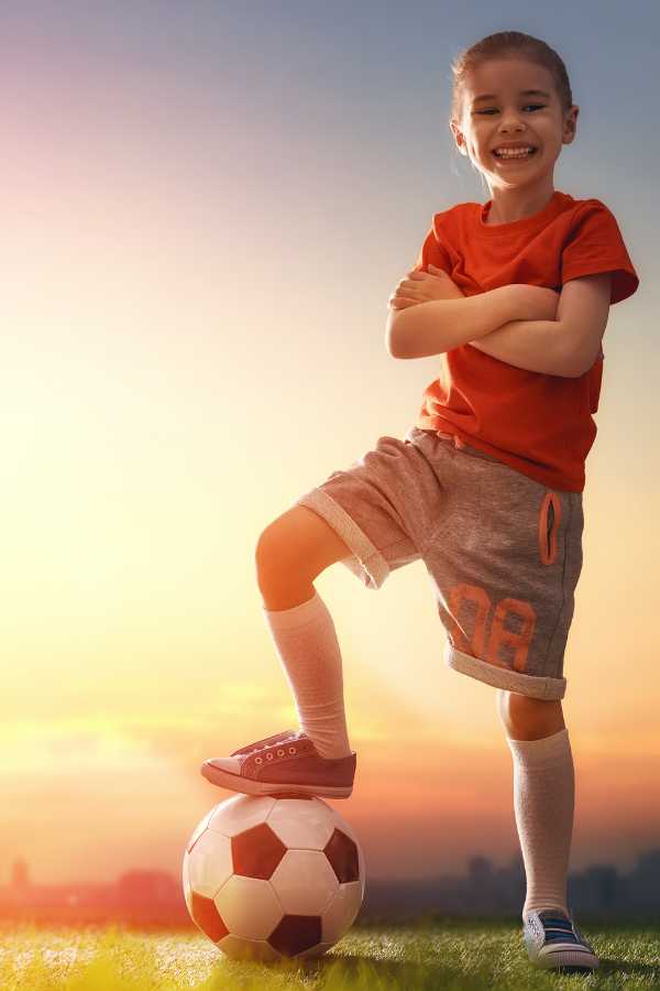 kid playing football